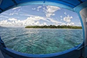 Siladen turquoise tropical paradise island biew through window photo