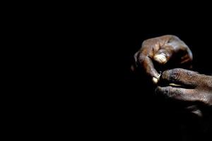 black hands holding fishing line photo