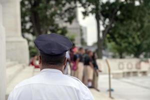 Black man afro policeman in Washington DC photo