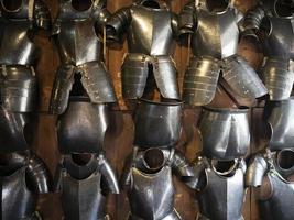 many medieval iron metal armor photo