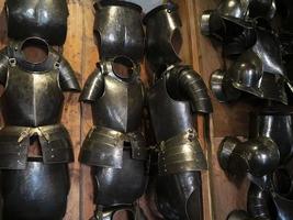 many medieval iron metal armor photo