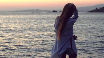 night scene with beauty young girl on the seashore video