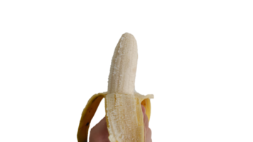 main tenant une banane pelée sur fond transparent png