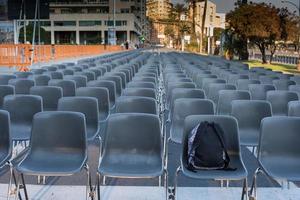 GENOVA, ITALY - MAY 26 2017 - Unattended backpack left on seat, was inspected for terrorist warning for Pope Francis mass in Kennedy Place photo