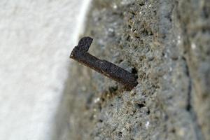 Rusted iron spike macro close up photo