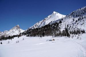 snow trekking in dolomites mountains photo