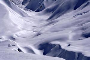 Avalanche snow slide in dolomites mountains photo