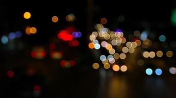 Light blurred headlights on street city video