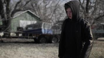 Young Homeless Teen Boy Walking In The Cold With A Backpack video