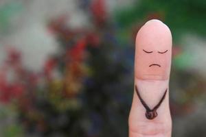 arte con los dedos de un hombre solitario y triste. foto
