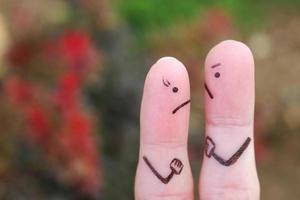 Fingers art of couple during quarrel. photo