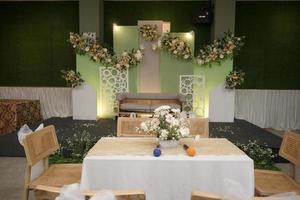 Table and Chairs in Wedding Ceremony Decoration photo