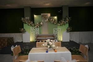 Table and Chairs in Wedding Ceremony Decoration photo