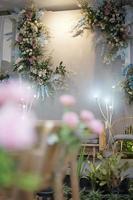 Beautiful Wedding Decoration with Flowers, Leaves and Lamps photo