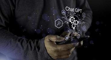 Businessman holding light icon GPT intelligence Ai.Chat GPT Chat with AI Artificial Intelligence, chat generate. Futuristic technology, robot in online system. photo
