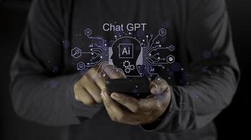 Businessman holding light icon GPT intelligence Ai.Chat GPT Chat with AI Artificial Intelligence, chat generate. Futuristic technology, robot in online system. photo