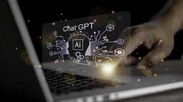 Businessman using chatbot in computer intelligence Ai. ChatGPT, using and chatting artificial intelligence. conversation assistant concept. photo