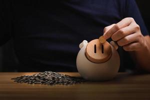 money save concept, businessman keeping money in a piggy bank. financial planning, save money for the future, Savings and pensions,  finance, investment, Financial planning. photo