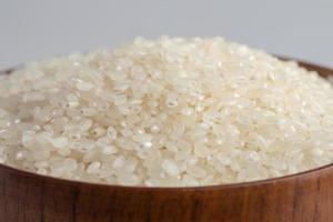 White rice, Masu and ears of rice on a white background photo