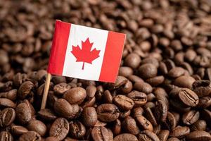 Canada flag on coffee bean, import export trade online commerce concept. flag on coffee bean, import export trade online commerce concept. photo