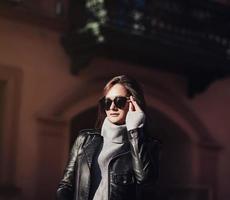 woman in black leather jacket photo