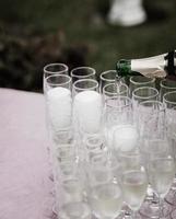 the waiter pours champagne photo