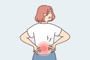 Woman stands with back to screen and holds on to red lower back after failing to lift heavy bag. Girl suffers from pain in spine needs massage or help of osteopath doctor. Flat vector illustration