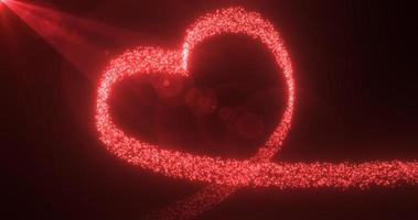 Abstract glowing festive heart love red from lines of magic energy from particles and dots on a dark background for Valentine's Day. Abstract background photo