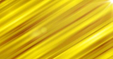 Abstract background of diagonal yellow gold iridescent sticks of lines stripes of bright shiny glowing beautiful photo