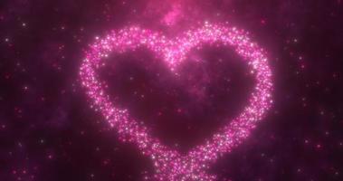 Glowing purple love heart made of particles on a purple festive background for Valentine's Day photo