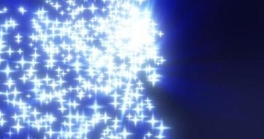 Abstract flying small blue glowing stars with bokeh and blur effect with shiny energetic magic glowing rays on dark background. Abstract background photo