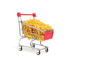 Cart shopping with pasta on a white background. photo
