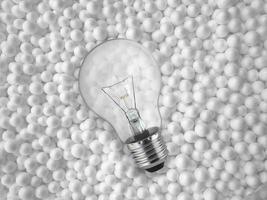 light bulbs on background of white styrofoam ball photo