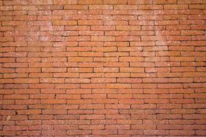 Red brick wall made of stone, Brick wall background photo