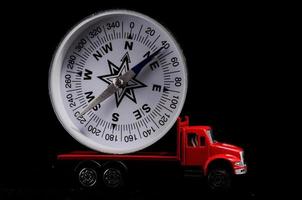 Miniature truck carrying a clock photo