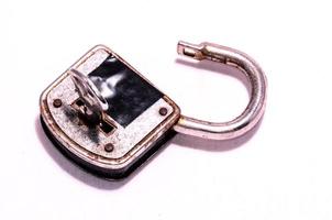 Open padlock on white background photo