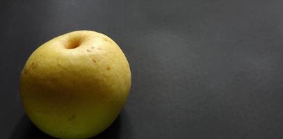 Pears fruit isolated on black background. photo