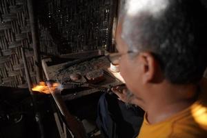 The process of making keris is done manually and traditionally photo