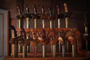 The Javanese keris that is being displayed is a traditional weapon photo