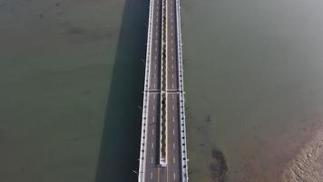 Aerial view of the Kretek 2 bridge which is the southern causeway bridge. Close to Depok beach, Bantul, Indonesia. Has a keris monument icon. photo