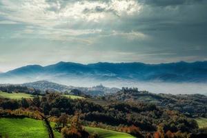 autumn landscapes of the Piedmontese Langhe with its colors and hills near Alba, in the province of Cuneo photo