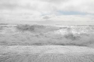 Huge white waves in cold north ocean in Iceland 2 photo