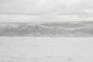 Huge white waves in cold north ocean in Iceland 17 photo