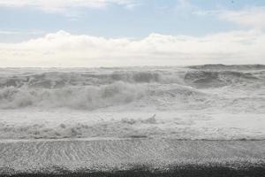 Huge white waves in cold north ocean in Iceland 5 photo