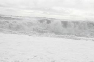 Huge white waves in cold north ocean in Iceland 13 photo