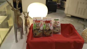Christmas cookie presentation for sale and some deer toy ornament. photo