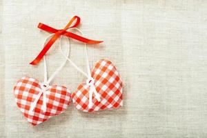 Heart made of cloth in red cell handmade Valentines Day photo