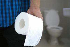 Men have abdominal pain. Want to shit. diarrhea concept photo