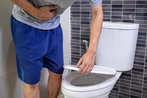 Men have contraction and stomach pain. diarrhea concept photo