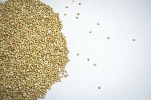 green buckwheat on a white background photo